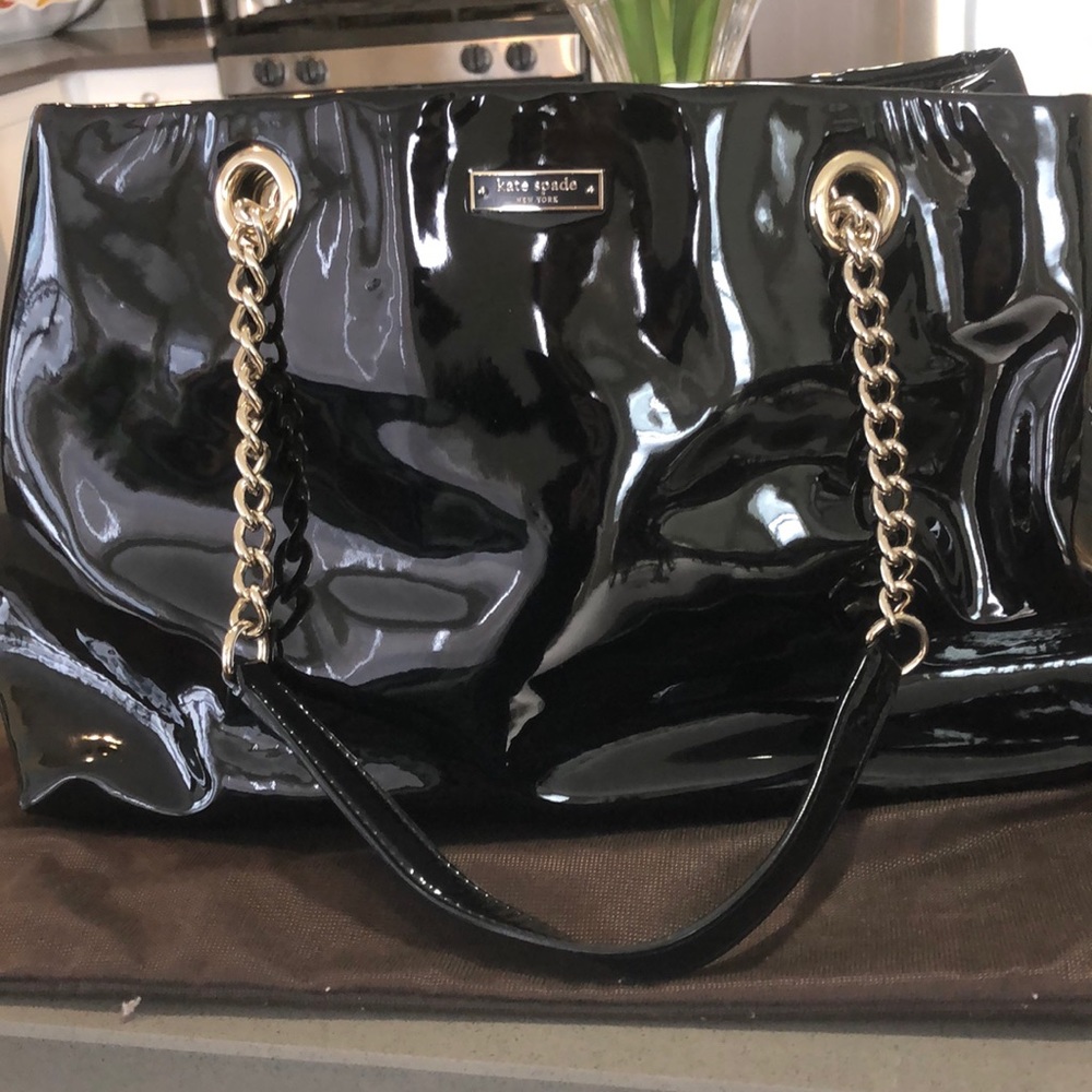 Kate Spade black patent leather handbag.